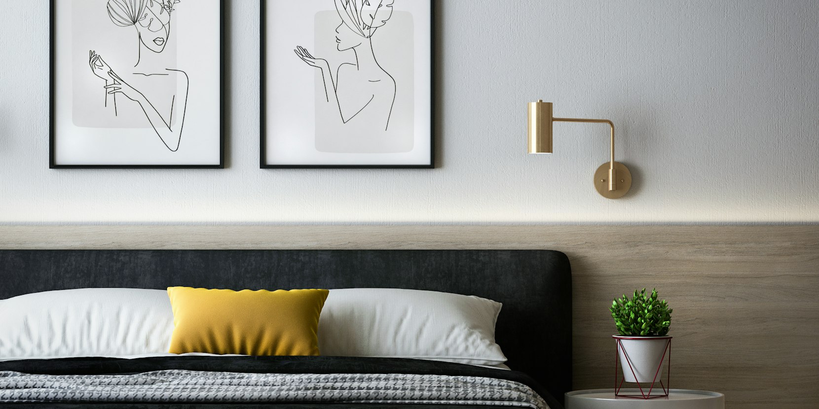 Side table beside a sofa with a lamp and stacked books