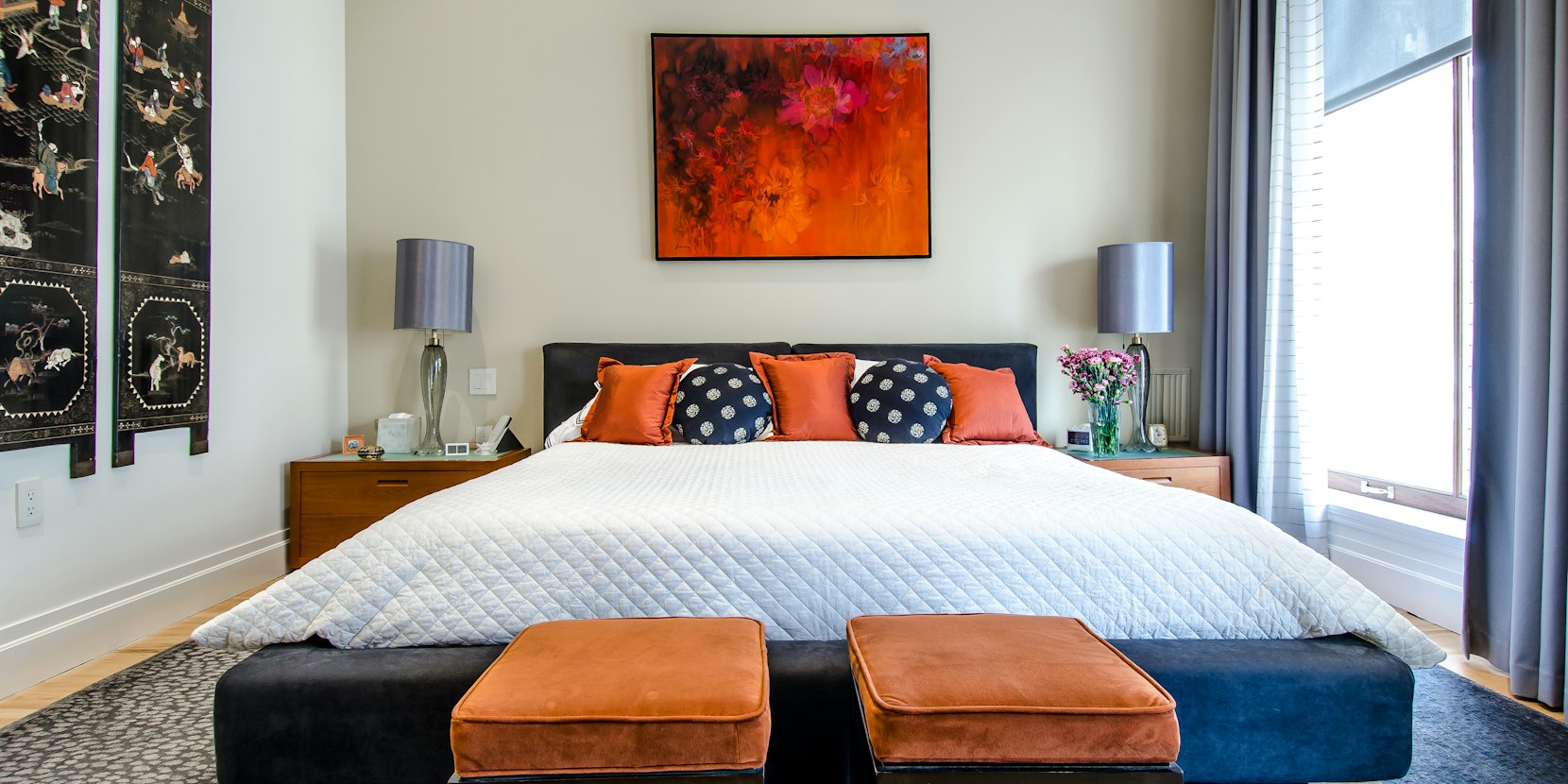 Media console and TV stand beneath a wall of framed art