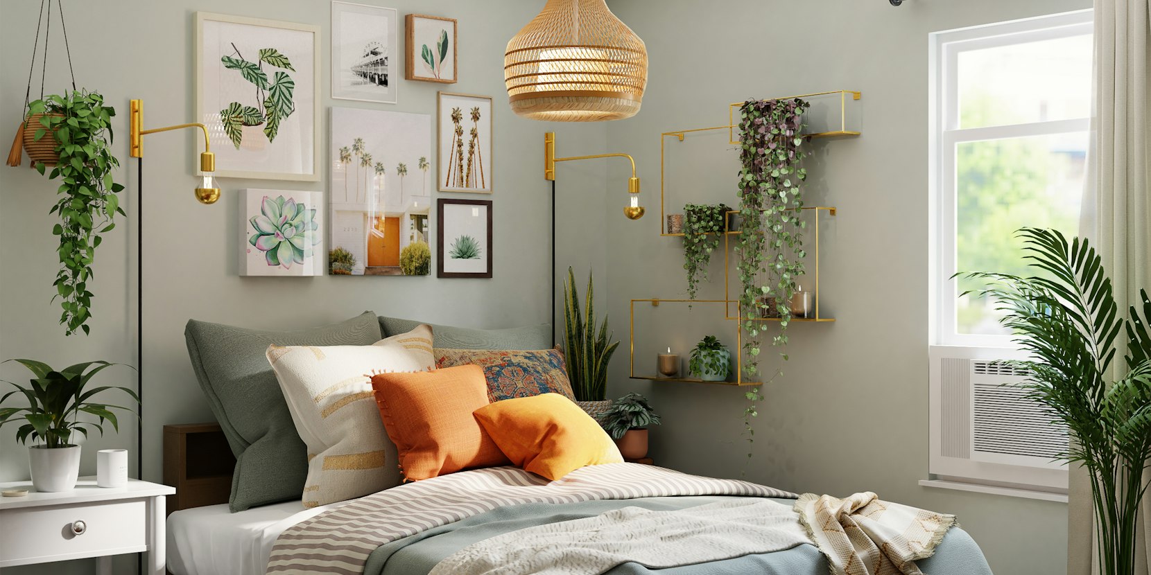 Framed wall art and prints arranged above a sofa